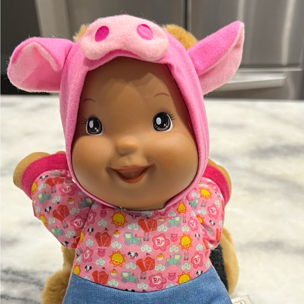 Pink and Blue Plush Dolls with Playful Patterns sings Old MacDonald